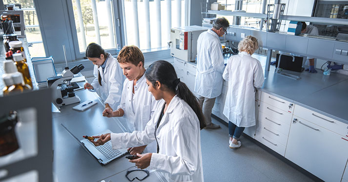 Researchers in lab