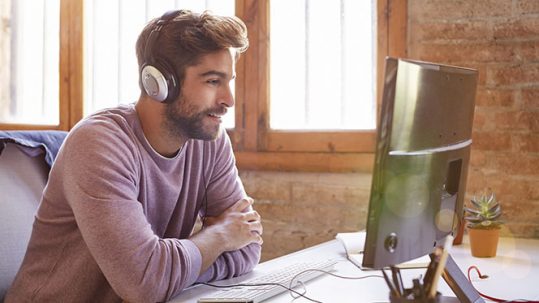 man at computer